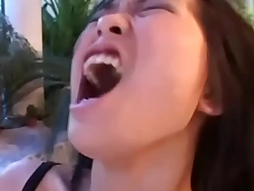 Little cute asian girl banged hard by a black cock