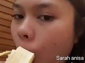 Asian girl sucking banana be beneficial to fun
