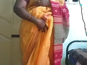 Desi indian horny tamil telugu kannada malayalam hindi cheating wife vanitha wearing orange colour saree showing big interior and shaved pussy unnerve hard interior unnerve nip rubbing pussy masturbation